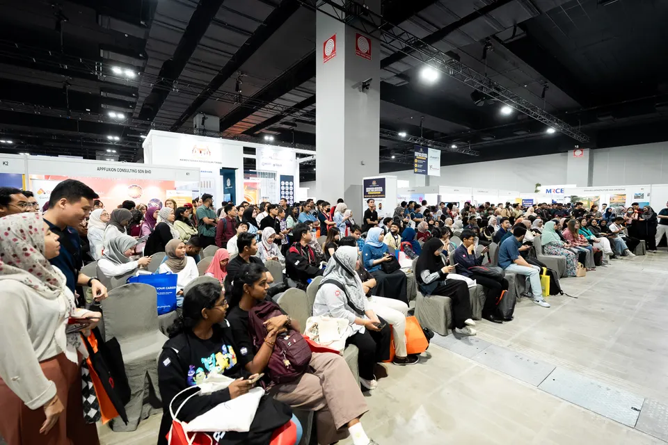 Rows of students and graduates seated in a hall, listening to a Career Power Talk