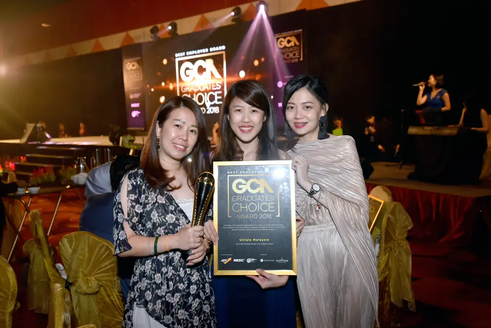 Winners holding their award in 2018