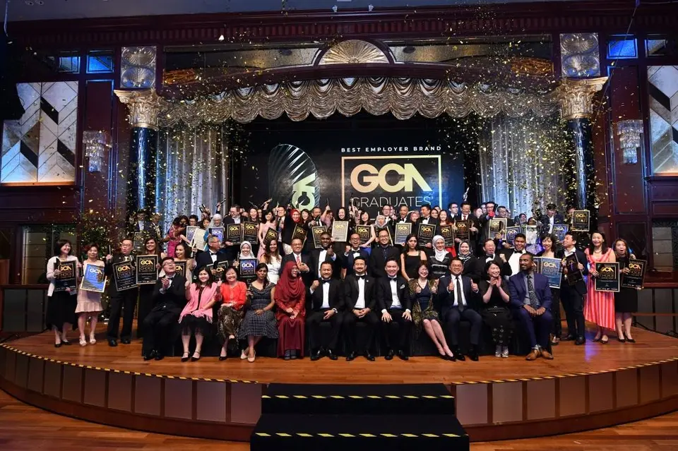 Winners and guests gathered on stage at the 2019 gala