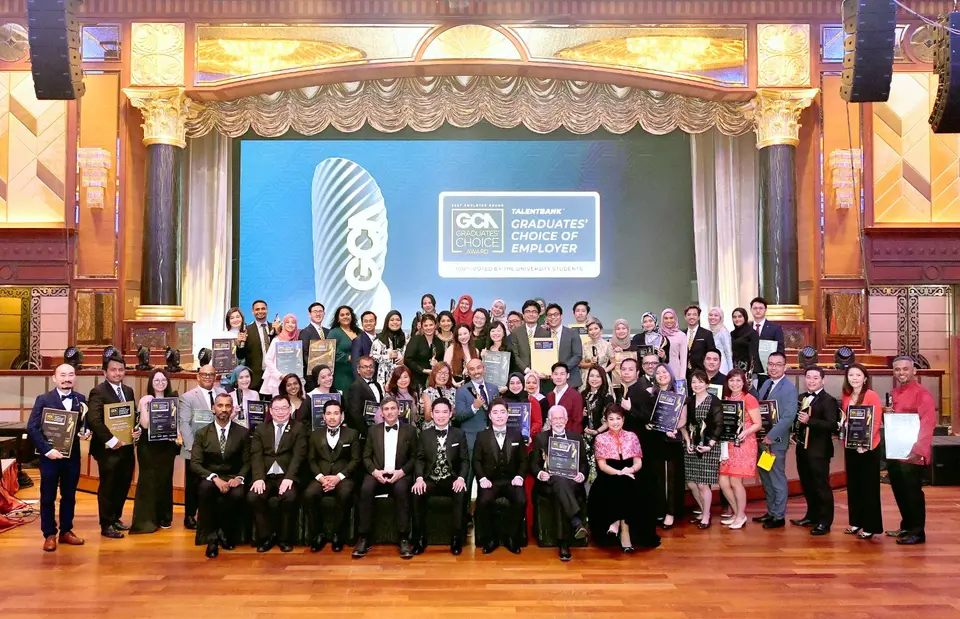 Winners and guests gathered on stage at the 2022 gala