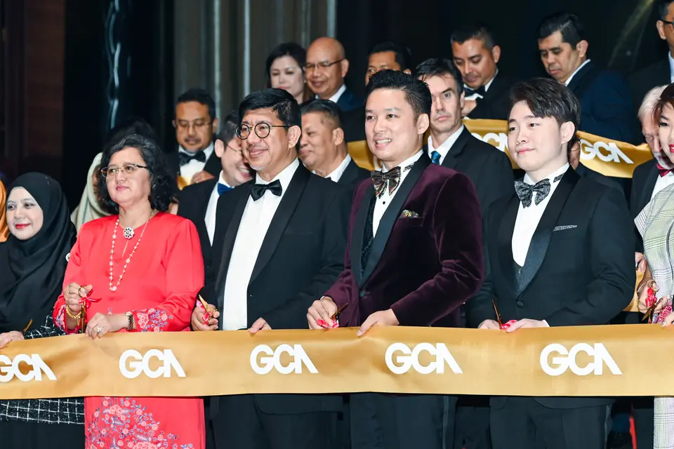 Guests cutting a GCA ribbon at the 2023 gala