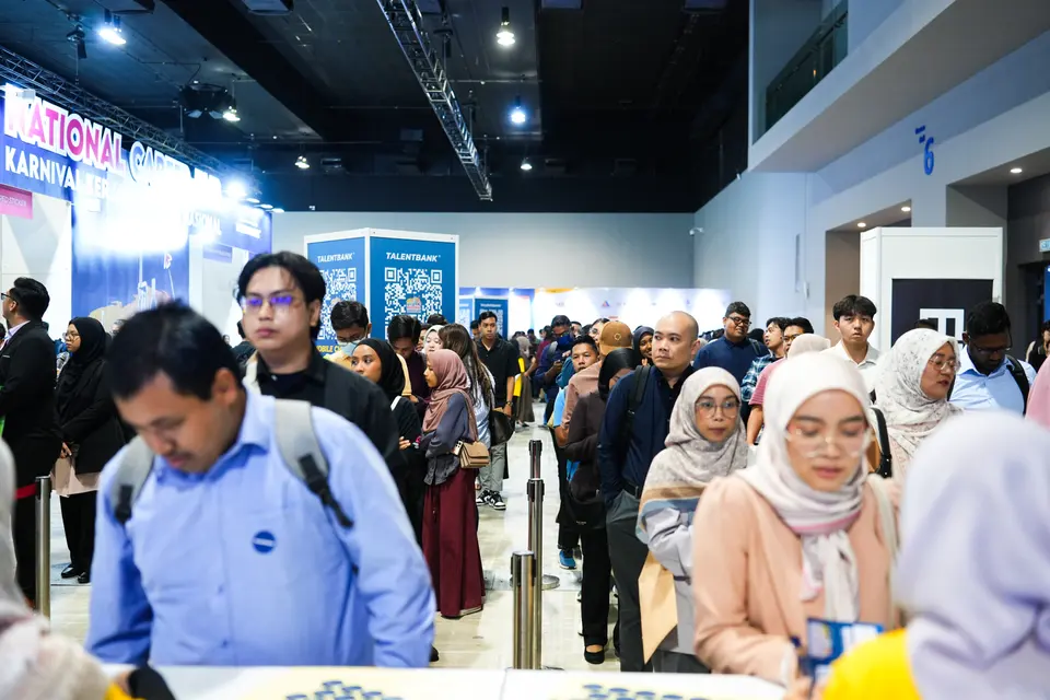Visitors queue to meet employers, 2024