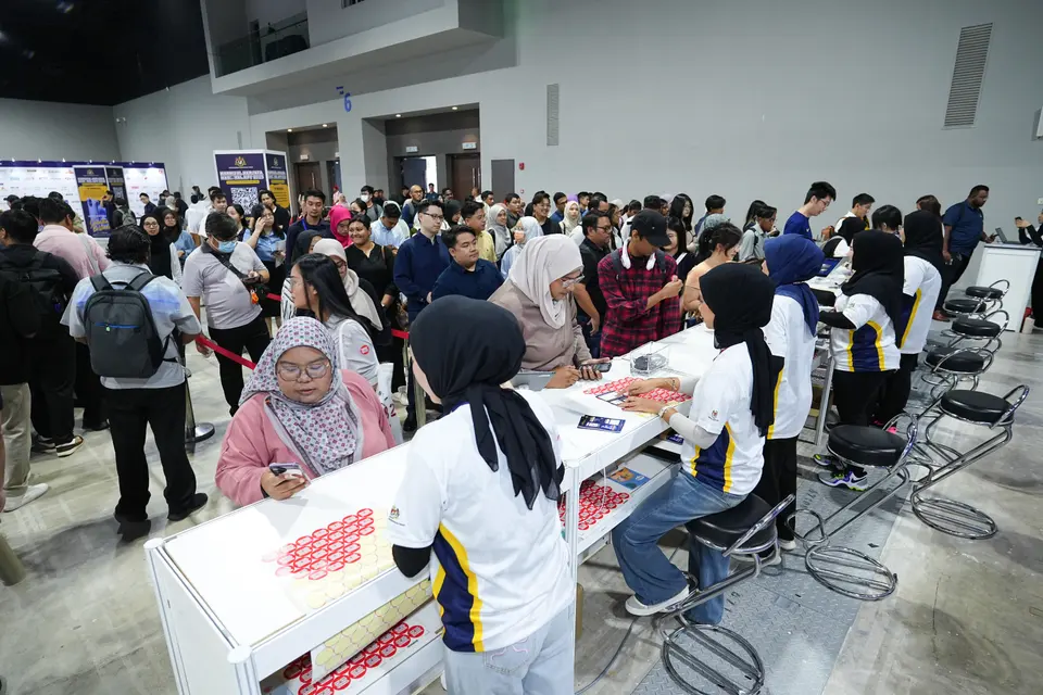 At the registration desks, 2025