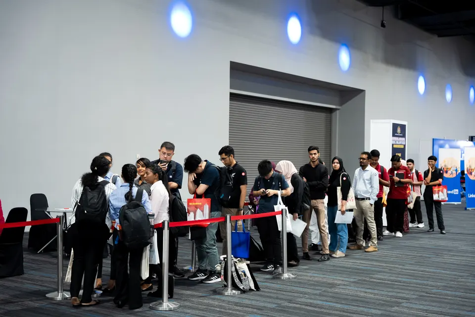 Visitors queueing along rope barriers in the mentor area of the National Career Fair 2025