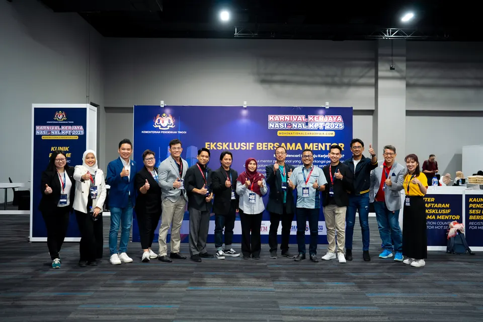 Mentors and the Talentbank team posing in front of the mentor backdrop at the National Career Fair 2025