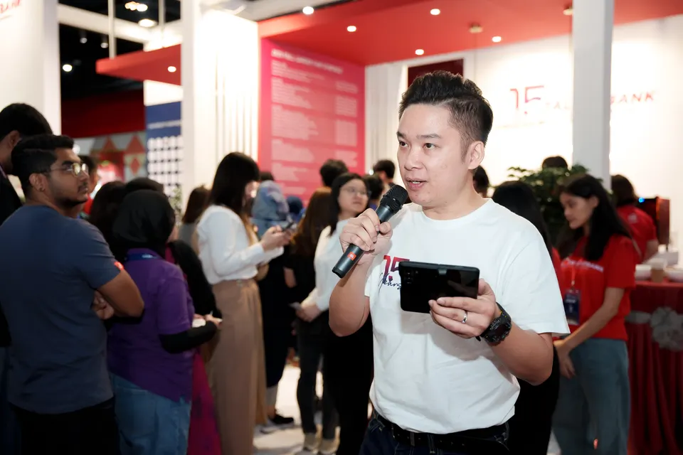 The host welcoming visitors, Talentbank Career Fair 2025
