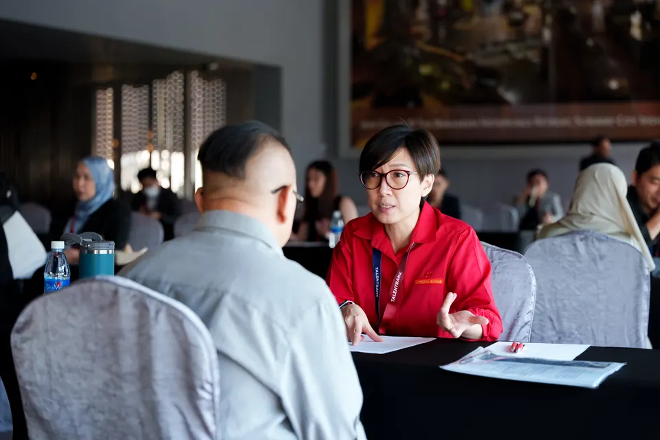 Candidates and recruiters in one-to-one conversations, Talentbank Career Fair 2025