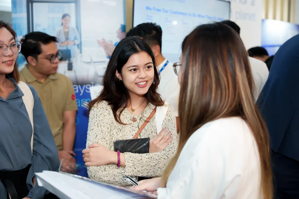 Candidates talking at the fair, Talentbank Career Fair 2025