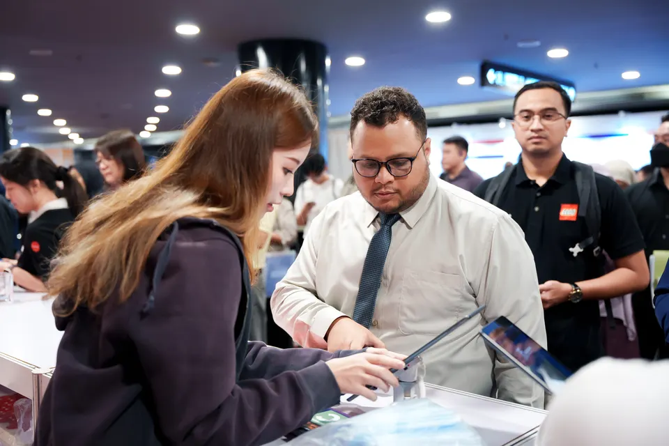 A candidate talking with an employer, Talentbank Career Fair 2025