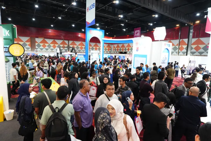 A busy hall of visitors and employer booths at the Talentbank Career Fair 2026